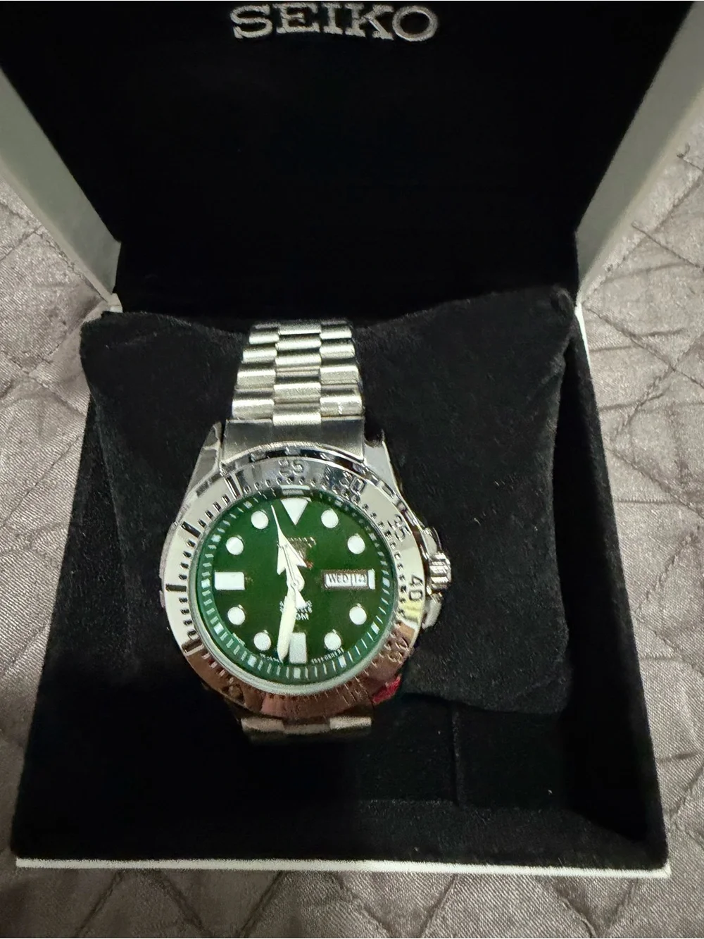 Seiko Stainless Steel Watch with Green Dial and Silver Bezel